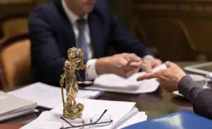 Kendrick and Associates Law - attorneys in north georgia signing legal documents